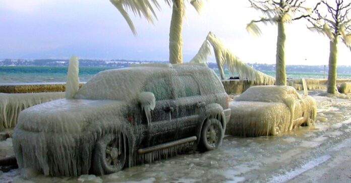 are climate change and global warming the same - the image shows a car completely covered in ice due to a extreme snow storm