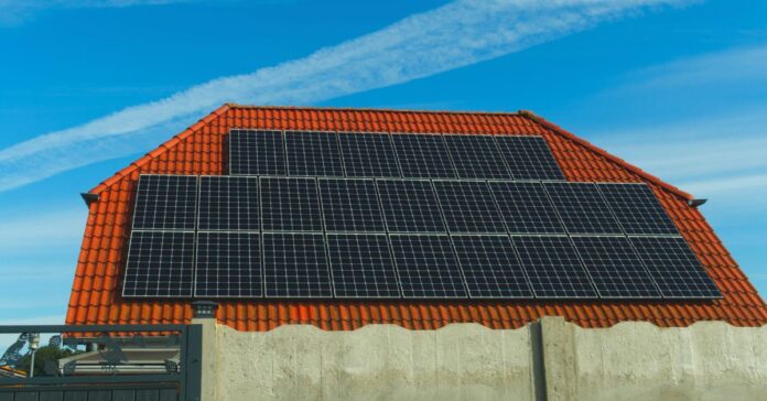 how solar energy is stored - the image shows a roof completely covered by solar panel modules